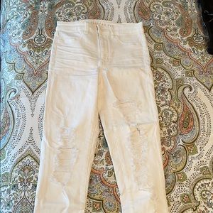 White ripped jeans. Extremely stretchy. Worn once